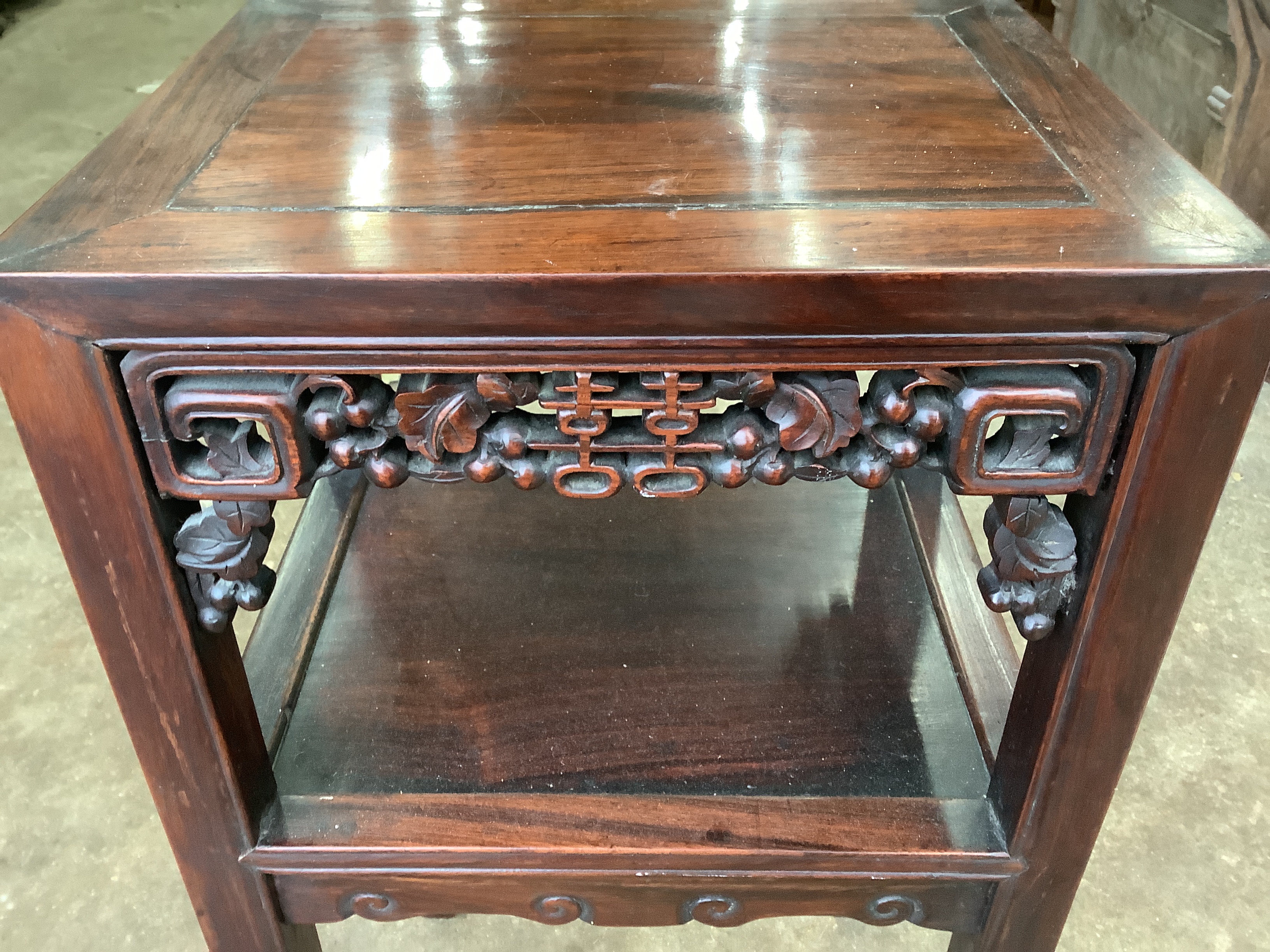 A Chinese rectangular hardwood two tier vase stand, width 41cm, depth 34cm, height 80cm